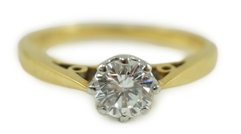 A 1960's 18ct gold and solitaire diamond ring